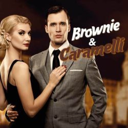 Woman in a black dress and a man in a suit looks ahead, on the front of the photo is the logotype: Brownie & Caramelli